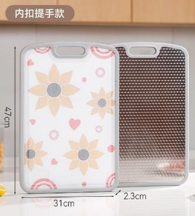 Cutting board with recessed handle